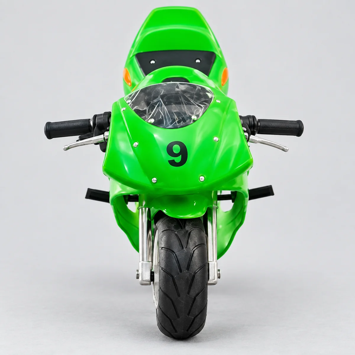 Front view of a green miniature motorcycle with number nine on its fairing