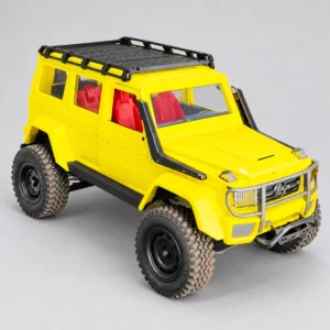 Yellow boxy off-road RC SUV with a black roof rack
